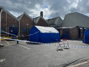 Active Crime Scene at Acton Business Centre cordoned off by police