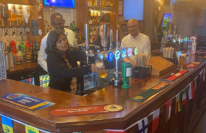 Dr Rupa Huq pulling pints at The Morton Arms