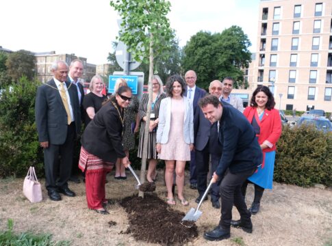 Adam Kay and Ealing Mayor Mohinder Midha planting tree outside Ealing Hospital