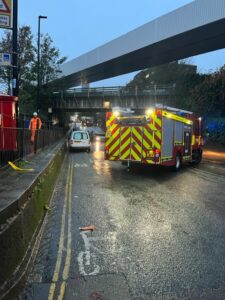 Victoria Road in North Acton floods again under the bridge