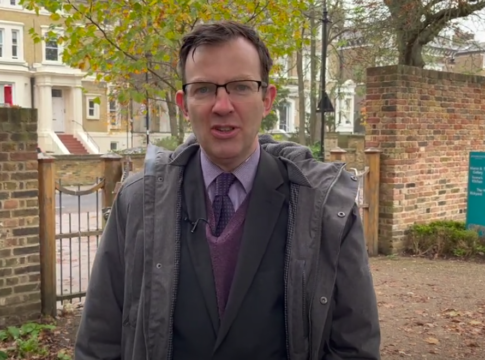 Dr Jonathan Oates explaining the history of Walpole Park in Ealing
