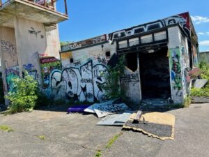 Derelict buildings and dangerous debris at Warren Farm