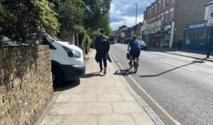 Van sticking out into pavement