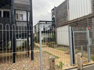 Entry to Marston Court in Hanwell. Entry system has been broken since 2020 and anyone can push gate and gain entry.