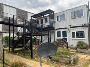 Marston Court in Hanwell using converted shipping containers to house people
