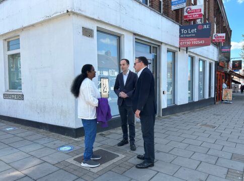 James Murray MP and Gareth Thomas MP outside closed Barclays in South Harrow with local resident