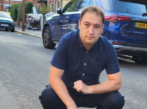 Councillor Gary Busuttil showing potholes on Fletcher Road