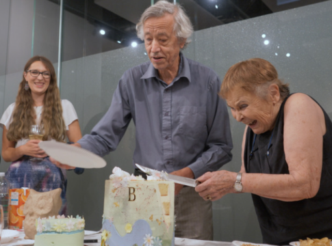 Kay FitzHerbert cuts the 50-year commemorative cake, assisted by BRCS President, Nic Ferriday and Laura Bacon, wildlife photographer and BRCS member. Photo: BRCS