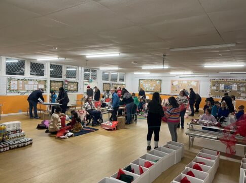 25th Ealing Scouts wrapping presents. Photo: 25th Ealing Scouts