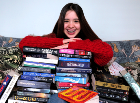 16-year-old Raine Wolfe has donated 40 books to Ealing Hospital for its new book trolley service. Photo: LNWH Trust