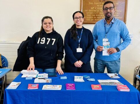 Health and Inequalities roadshow NHS stand in Northolt with Ariana Florentino Gonzalez, Abdi Ali and a volunteer.