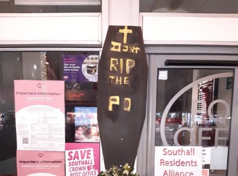 Wreath and coffin laid at Southall Broadway Post Office