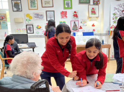 Notting Hill and Ealing High school pupils volunteering at St David's. Photo: NHEHS