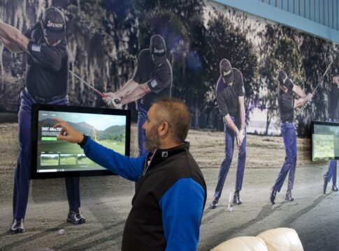 Learning to play golf. Photo: North London Golf Academy