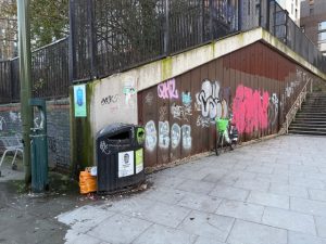 Graffiti and litter inside North Acton Square. Photo: EALING.NEWS