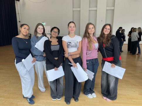 Notting Hill & Ealing High School students celebrate GCSE success. Photo: NHEHS