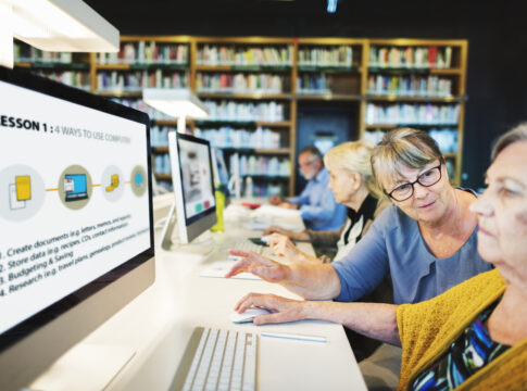 Learning to use computers. Photo: Rawpixel / Envato