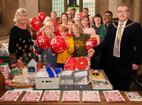 (L-R): Sue Green, founder, Ealing Charity Christmas Card Shop. Anthony Kelly, Mayor of Ealing with volunteers and representatives charities supported. Photo: Roger Green