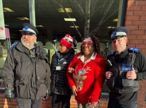 Elaisha Bedasee with her son and local officers. Photo: Elaisha Bedasee,