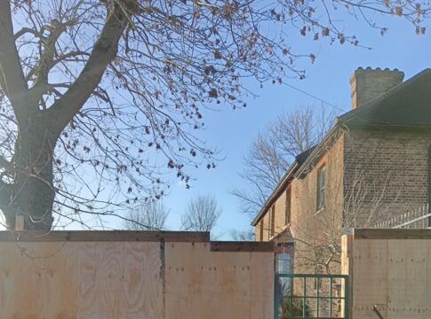 Hoardings around Horsenden Farmhouse. Photo: Perivale Brewery