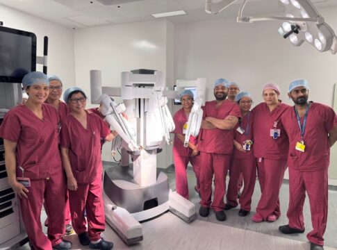 Ealing Hospital theatres team with robot. Photo: LNWH