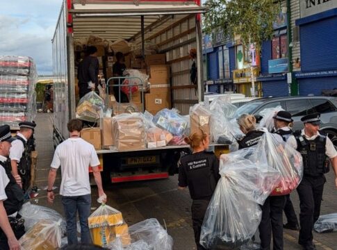 Officers filling a lorry with seized goods in Southall. Photo: Ealing Council
